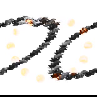 David Yurman Silver Spiritual Beads Tiger's Eye Jet Bracelet: Metal : Sterling Silver Designer : David Yurman Gemstone : Tiger's eye 8.5mm, Jet 8-8.5mm. Measurements : Bracelet is 8.75" long. Marked: : M, 925, DY. Weight: : 25.2 grams 