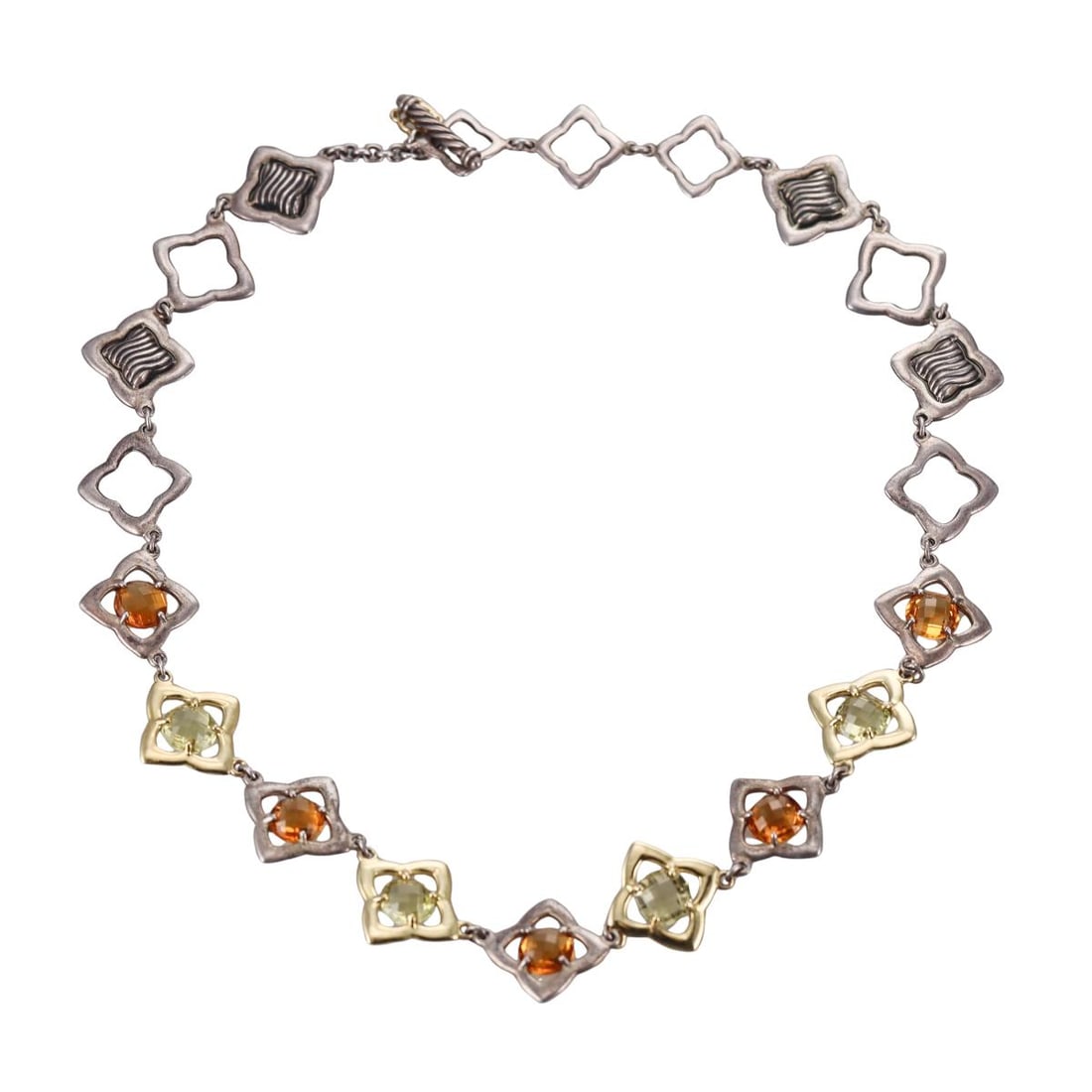 David Yurman 18k Gold Silver Citrine Quatrefoil Necklace: Metal : Sterling Silver/ 18k Yellow Gold Designer : David Yurman Gemstone : Citrine. Measurements : Necklace is 17" long and 18mm wide. Marked: : DY, 925, 750. Weight: : 40.
