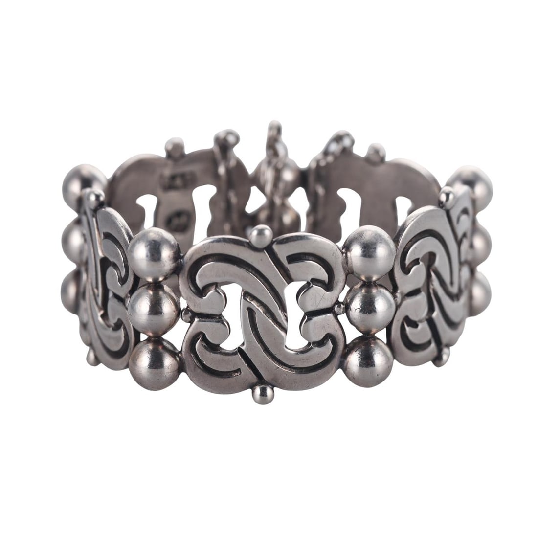 1940s-1950s Hector Aguilar Mexico 940 Silver Fertility Bracelet: Metal : Sterling Silver Designer : Hector Aguilar Gemstone : None Measurements : Bracelet is 6.5" long and 30mm wide. Marked: : HA 940, Taxco. Weight: : 66.6 grams