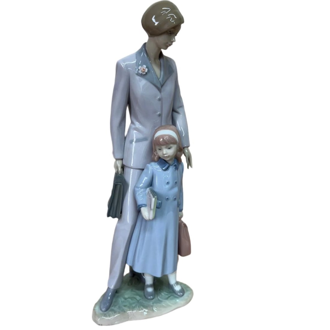 LLADRO On Our Way Women & Child Figure 6544: Material : Porcelain Designer : LLADRO Measurements : H: 13'' Marked: : LLADRO, Hand made in Spain. Condition: : New Additional: n/a