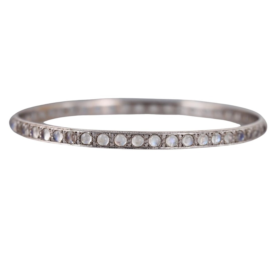 Irene Neuwirth 18k Gold Moonstone Bangle Bracelet: Metal : 18k White Gold Designer : Irene Neuwirth Gemstone : Moonstones 2.8mm. Measurements : Bracelet will fit approx. 7" wrist, inner diameter 65mm or 2.5". Width 4.5mm. Marked: : 18k.