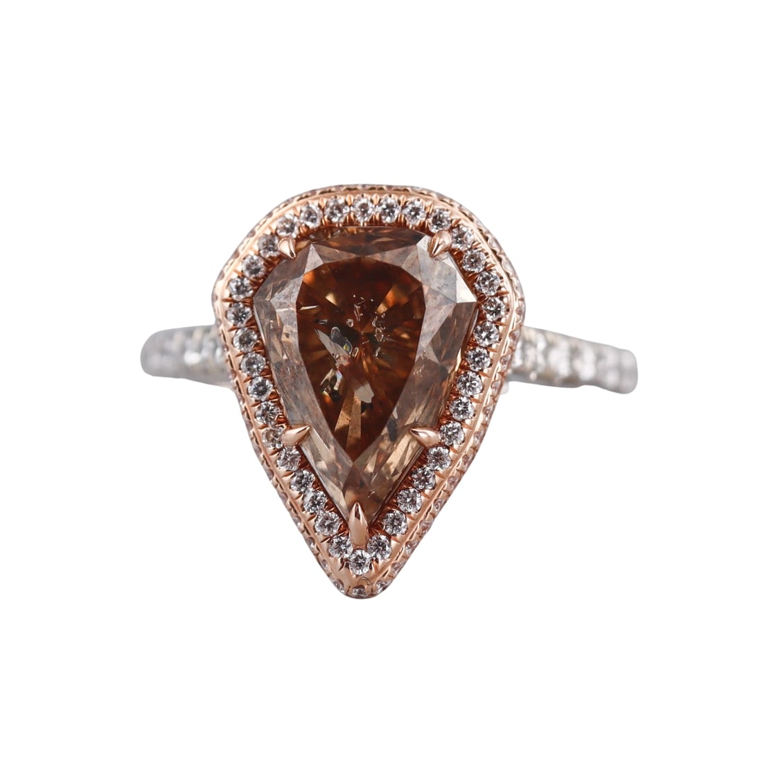 18k Gold 4ct Fancy Brown Diamond Engagement Ring: Metal : 18k White Rose Gold Designer : Not Signed Gemstone : Fancy brown diamond approx. 4ct (imperfect), SIde diamonds approx. 0.40ctw. Measurements : Ring size 5, top is 15.5 x 11.5mm. M
