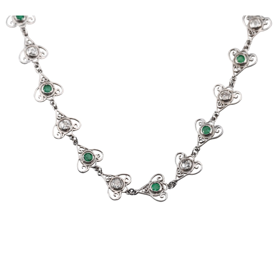 Antique Filigree Platinum Diamond Emerald Necklace: Metal : Platinum Designer : Not Signed Gemstone : Diamonds approx. 1.50ctw, Emeralds approx. 1.20ctw. Measurements : Necklace is 23.5" long and 8.5mm wide. Marked: : 1-6673 on clasp.