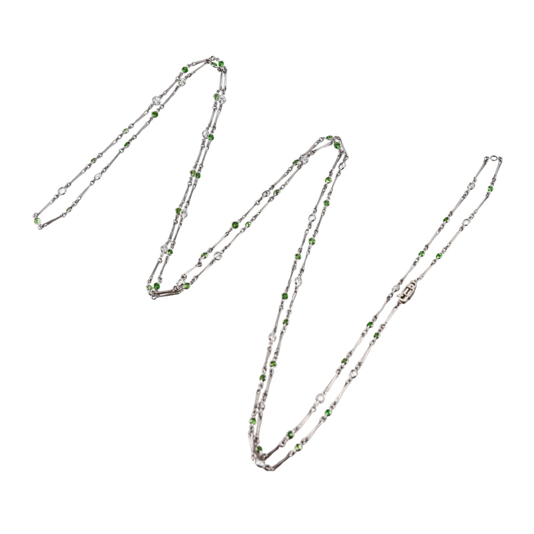 Platinum 4.54ctw Diamond 6.28ctw Demantoid Garnet Long Necklace: Metal : Platinum Designer : Not Signed Gemstone : Diamonds approx. 4.54ctw, Demantoid garnets approx. 6.28ctw. Measurements : Necklace is 62" long. Marked: : Tested plat. Weig