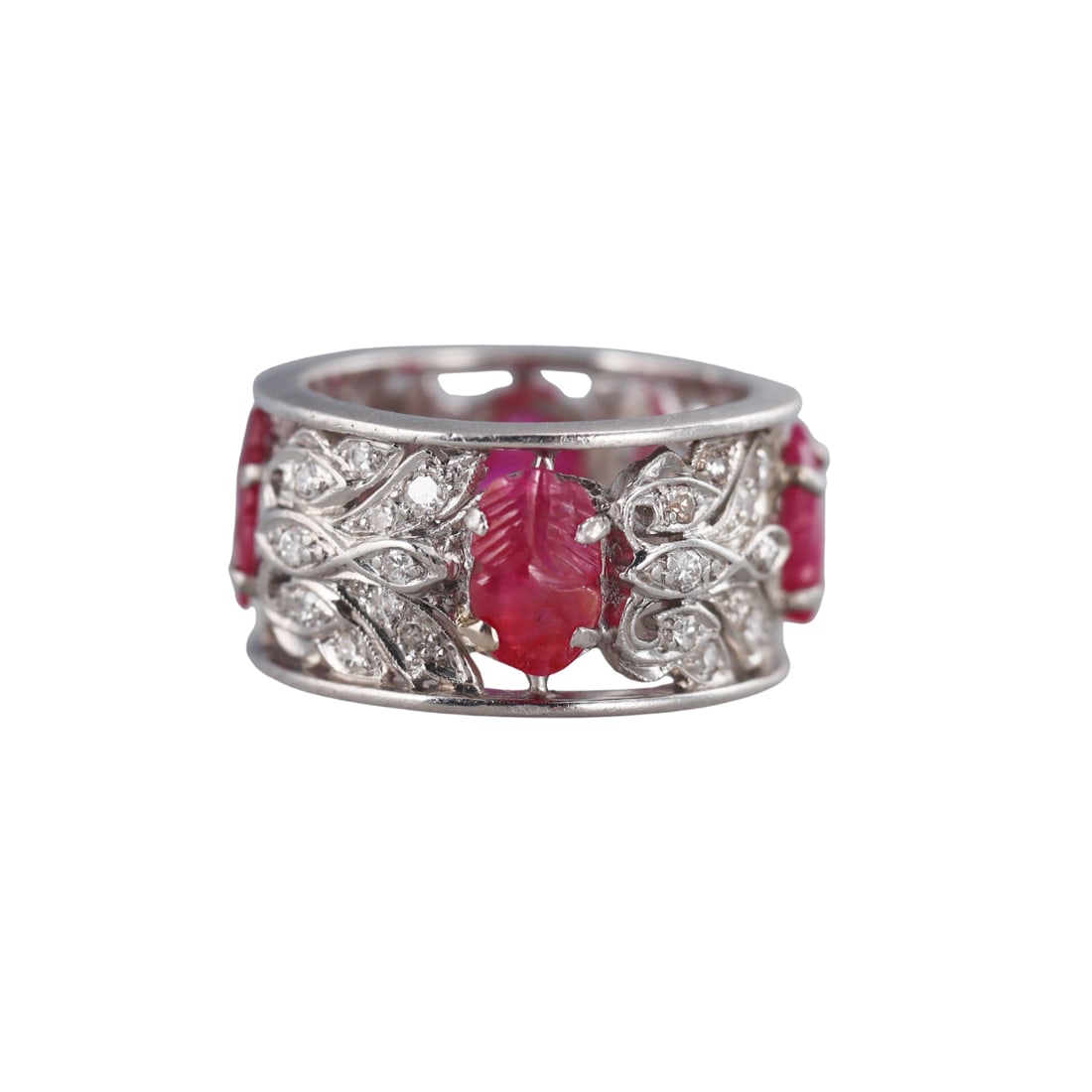 Mid Century Platinum Diamond Carved Ruby Eternity Band Ring: Metal : Platinum Designer : Not Signed Gemstone : Diamonds approx. 0.12ctw. Carved ruby Measurements : Ring size 4 3/4, band is 10.4mm Marked: : Tested - Plat Weight: : 8