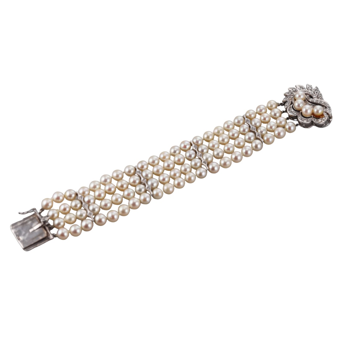 Mid Century Vintage 14k Gold Pearl Diamond Bracelet: Metal : 14k White Gold Designer : Not Signed Gemstone : Pearls 6-6.3mm, Diamonds approx. 0.50ctw. Measurements : Bracelet is 7" long and 30mm wide. Marked: : 14k. Weight: <