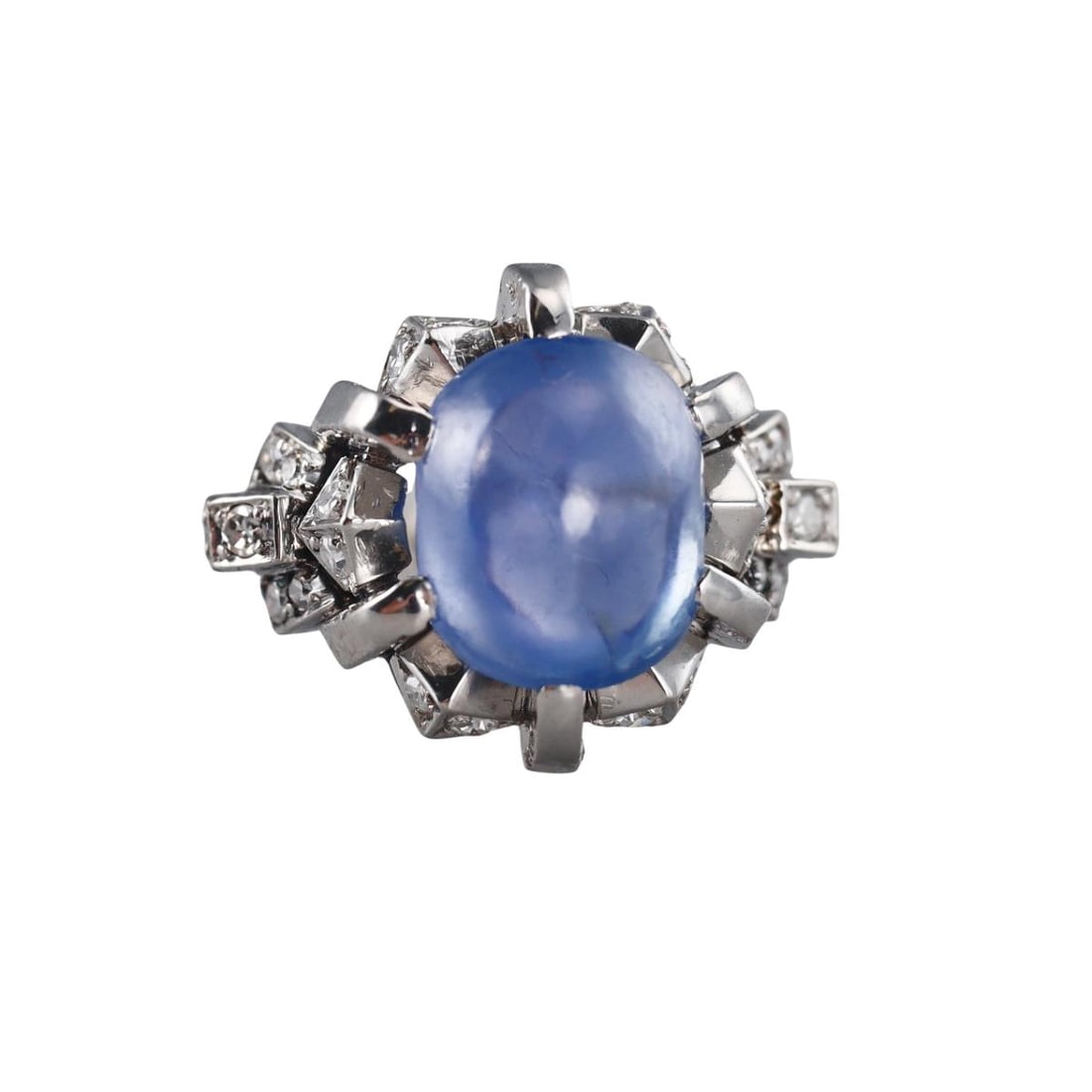 Platinum 6.37ct Sapphire Cabochon Diamond Ring: Metal : Platinum Designer : Not Signed Gemstone : Sapphire 6.37ct, Diamonds approx. 0.24ctw. Measurements : Ring size 6.5, top width 16mm. Marked: : 6.37ct. Weight: : 10