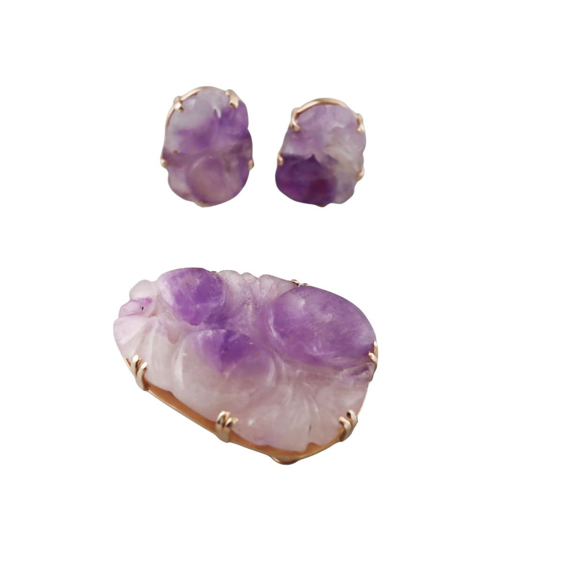 14K Gold Carved Purple Gemstone Brooch Earrings Set: Metal : 14K Yellow Gold Designer : Not signed Gemstone : Carved Purple Stone Measurements : Brooch/Pendant is 53mm x 45mm. Earrings are 28mm x 20mm. Marked: : 14K Weight: :