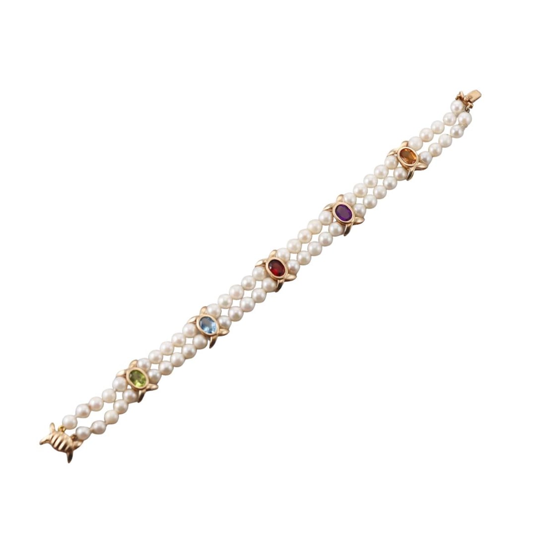 Vintage 14k Gold Multi Gemstone Pearl Bracelet: Metal : 14k Yellow Gold Designer : Not Signed Gemstone : Pearls 4.5-5mm, Peridot, Amethyst, Citrine, Topaz, Garnet Measurements : Bracelet is 7" long and 11mm wide. Marked: : Tested 14
