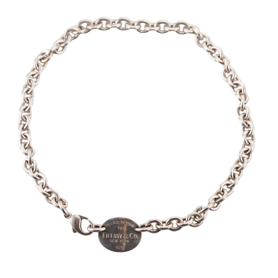 Tiffany & Co Return To Sterling Silver Tag Pendant Choker Necklace: Metal : Sterling Silver Designer : Tiffany & Co Gemstone : None Measurements : Necklace is 16" long, Tag is 18mm wide Marked: : Tiffany & Co 925 Weight: : 53.3 grams
