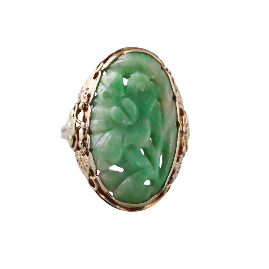 Arts & Crafts 14K Gold Carved Jade Ring: Metal : 14K Yellow Gold Designer : Not Signed Gemstone : Carved Jade Measurements : Ring size 6.75. Ring top is 24mm Marked: : 14K Weight: : 4.9 grams Condition: <
