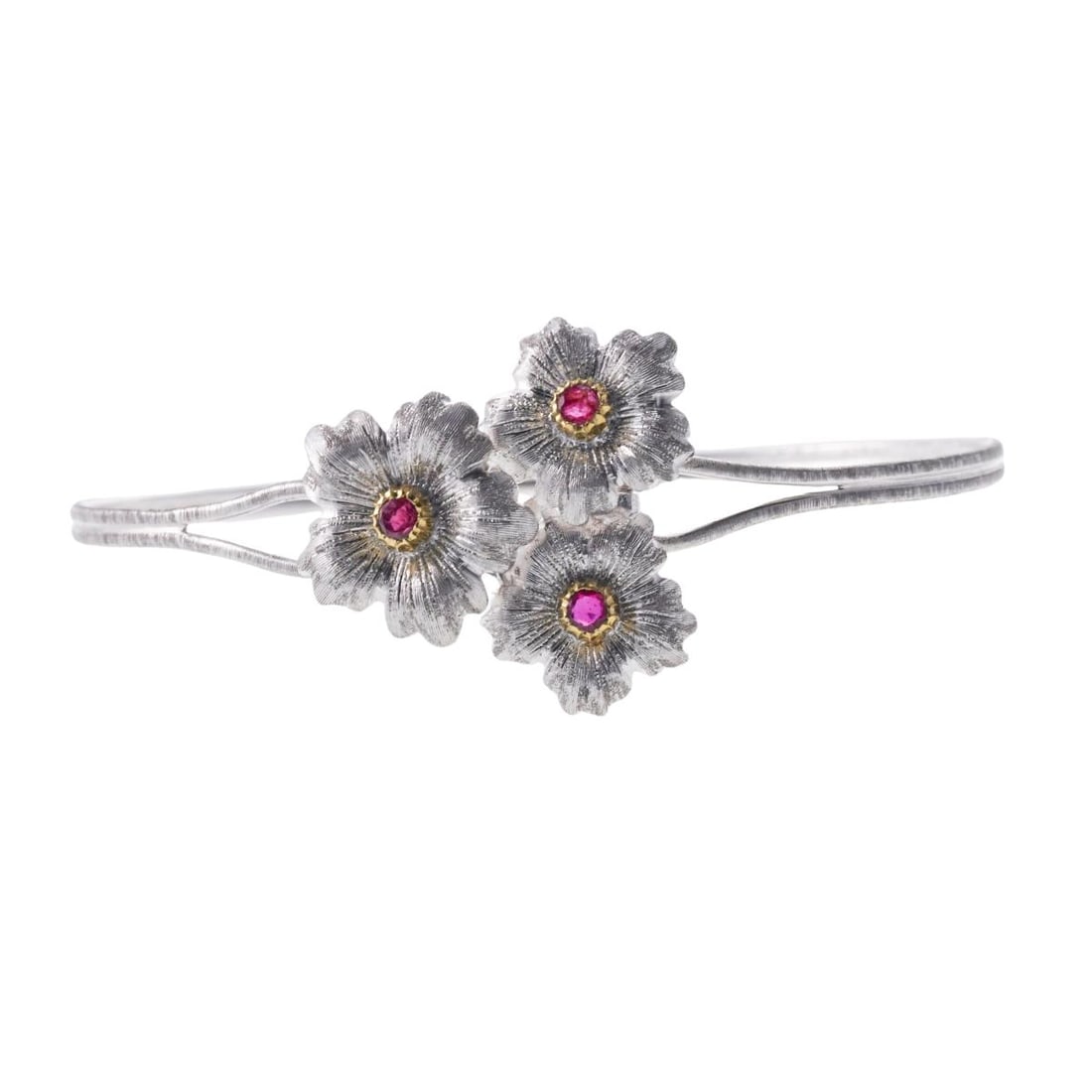 Buccellati Gold Ruby Flower Bracelet: Material : 18k White Gold Designer : Buccellati Measurements : Bracelet will fit 6.5" wrist x 25mm wide. Marked: : Buccellati 18k Italy. Weight: : 8.8 grams Condition: Excel