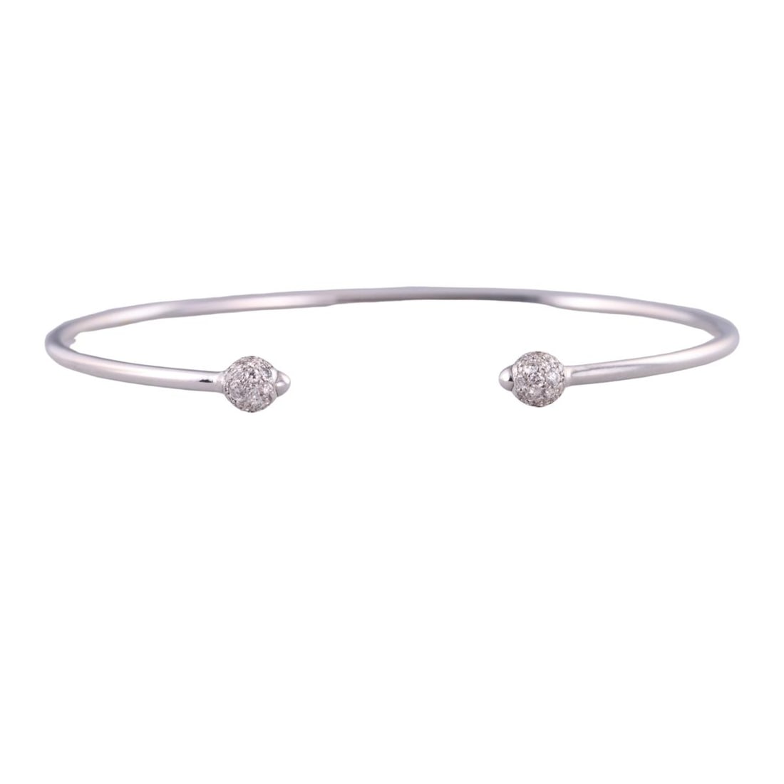 Pomellato M'ama Non M'ama 18k Gold Diamond Cuff Bracelet: Metal : 18k White Gold Designer : Pomellato Gemstone : Diamonds approx. 0.24ctw. Measurements : Bracelet will fit approx. 6.5-6.75" wrist, ends are 4.5mm. Marked: : Pomellato, Italian