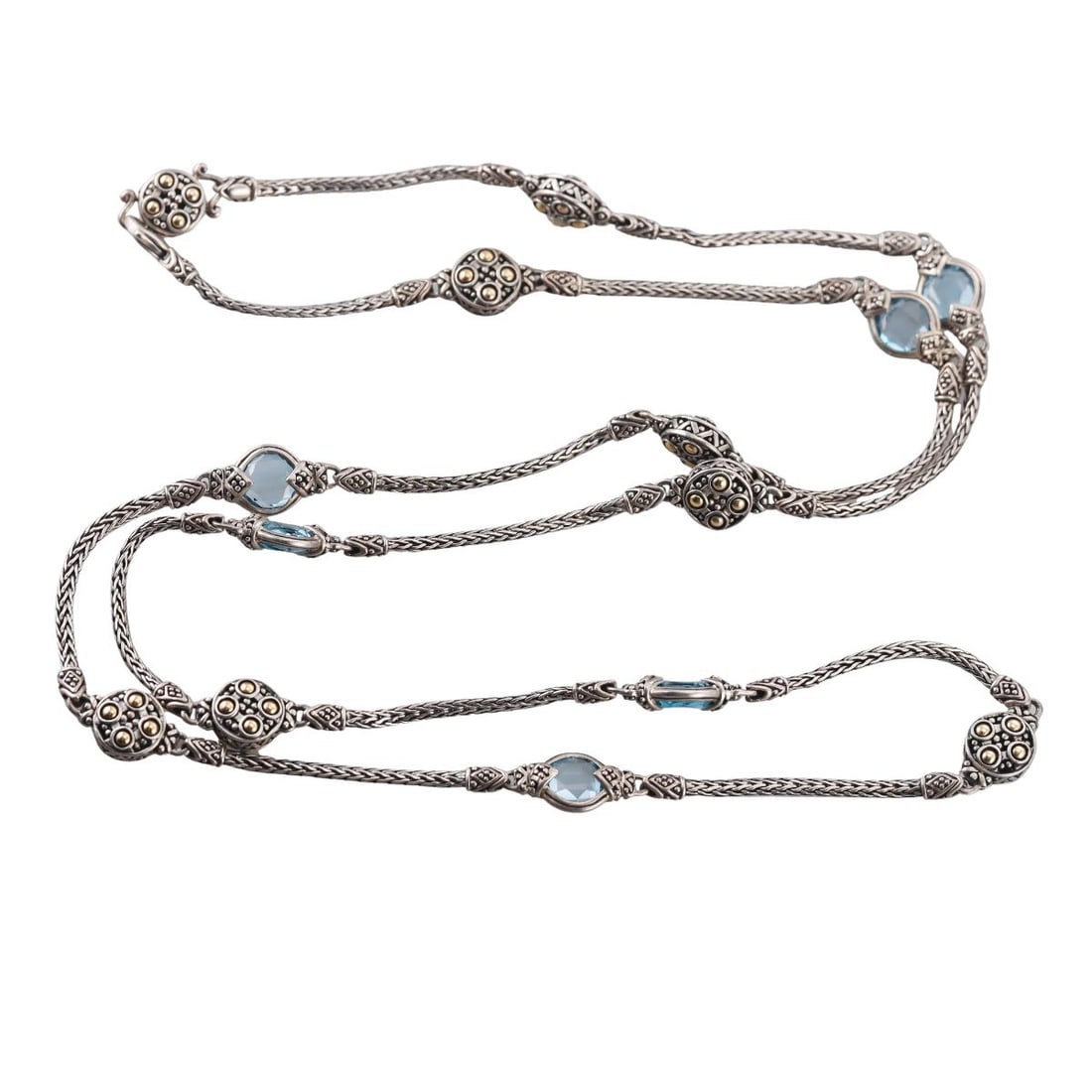 John Hardy 18K Gold Silver Blue Topaz Long Station Necklace: Metal : 18K Yellow Gold, Sterling Silver Designer : John Hardy Gemstone : Blue Topaz Measurements : Necklace is 36" long and 11mm at widest point Marked: : JH, 925, 18K Weight: : 52.3 grams