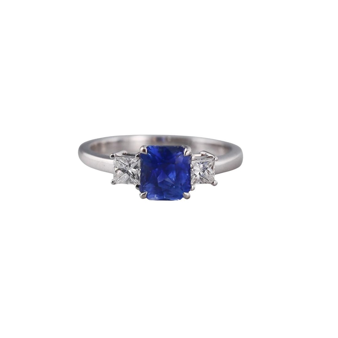 18K Gold Diamond Sapphire Three Stone Ring: Metal : 18K White Gold Designer : Not Signed Gemstone : Diamonds-approx.0.40ctw. Sapphire-approx. 0.70ct Measurements : Ring size 6.5, top is 6mm. Marked: : 18K, NJ Weight: