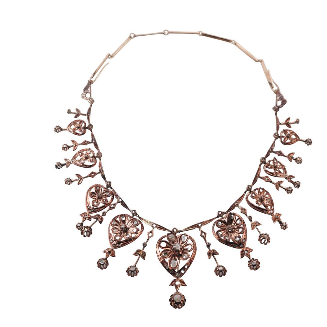 Antique Victorian Gold Rose Cut Diamond Necklace: Metal : 10K Rose Gold Designer : Not Signed Gemstone : Rose Cut Diamonds Measurements : Necklace is 17" long. Necklace drop is 50mm Marked: : Tested 10K Weight: : 46.5 gr