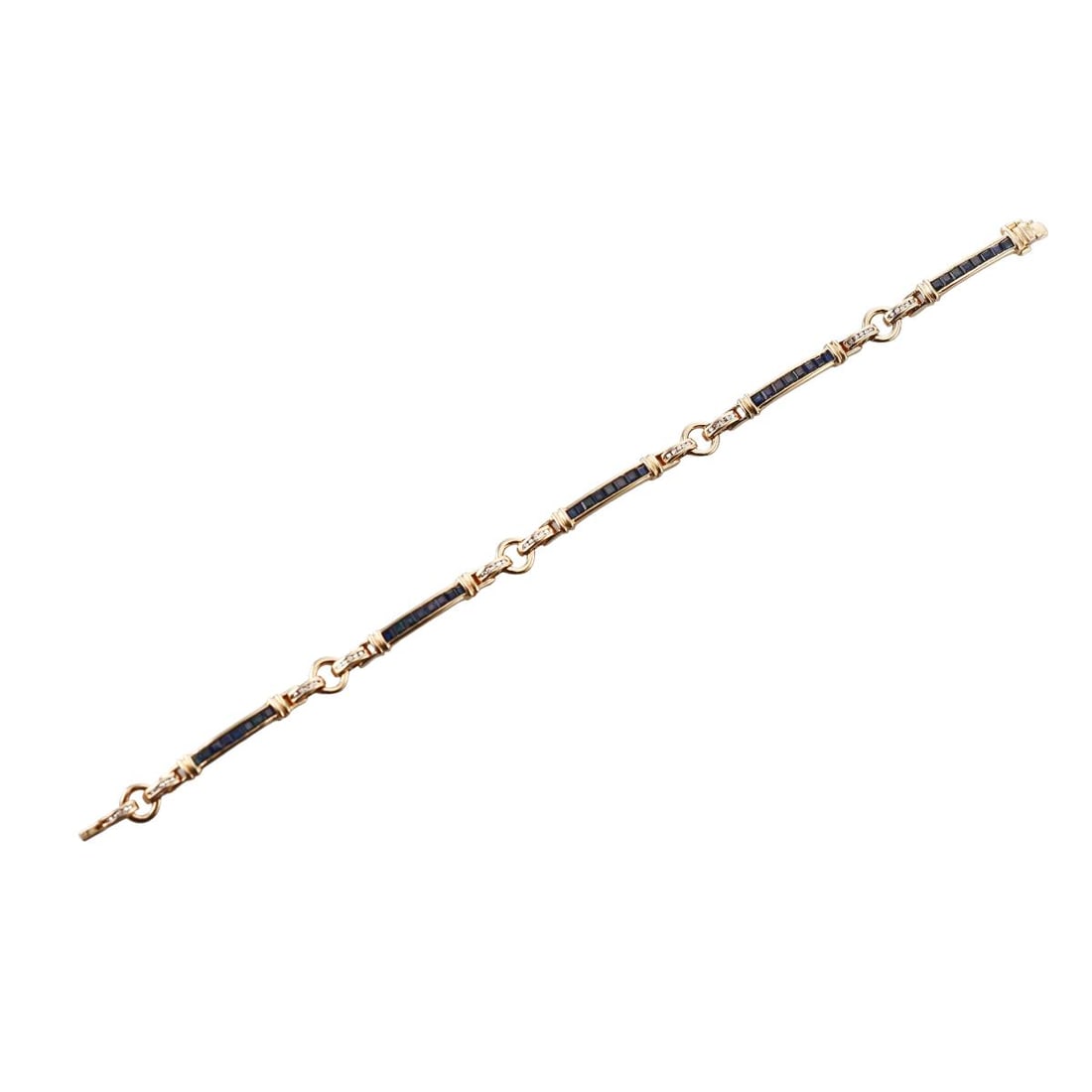 18K Gold Diamond Sapphire Bracelet: Metal : 18K Yellow Gold Designer : Not Signed Gemstone : Diamonds, Sapphires Measurements : Bracelet is 7.25" long and 6.5mm at widest point Marked: : 750, 12 Weight: :