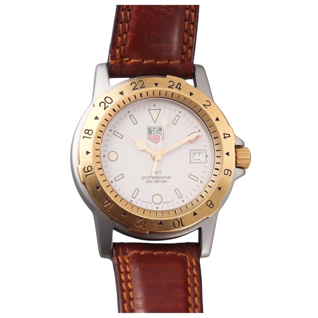 Tag Heuer Professional 1500 Series GMT Watch 155.706: Metal : Stainless Steel, 18K Gold Plated Designer : Tag Heuer Movement : Quartz - working order Measurements : Case 40mm, Original leather band and buckle Reference/Model: : GMT Professio