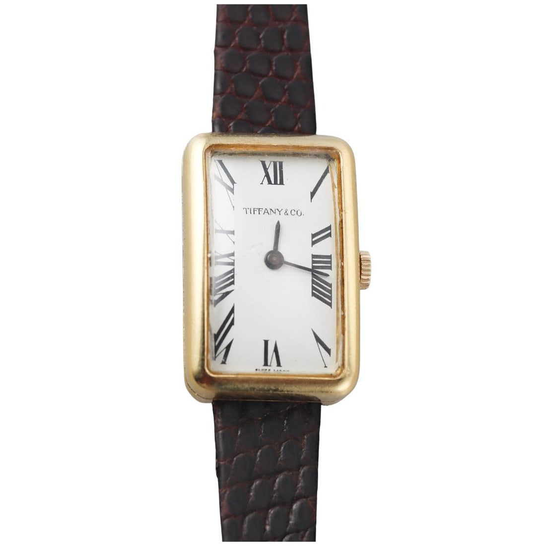 1970s Tiffany & Co Chopard 18k Gold Manual Wind Watch: Metal : 18k Yellow Gold Designer : Tiffany & Co / Chopard Movement & Case Movement : Manual wind - working order. Measurements : Case 18mm x 28mm. Band and buckle not original - 7" long. Ref