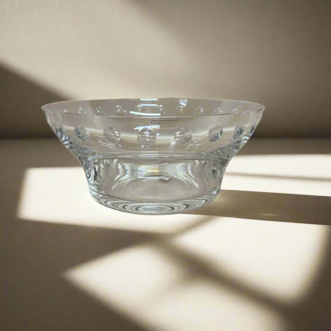 Saint-Louis Bubbles Crystal Clear Large Bowl: Material : Crystal Designer : Saint-Louis Measurements : D: 9'', H: 4'' Marked: : Saint-Louis Condition: : New/store sample. Additional: With box (not in great shape)