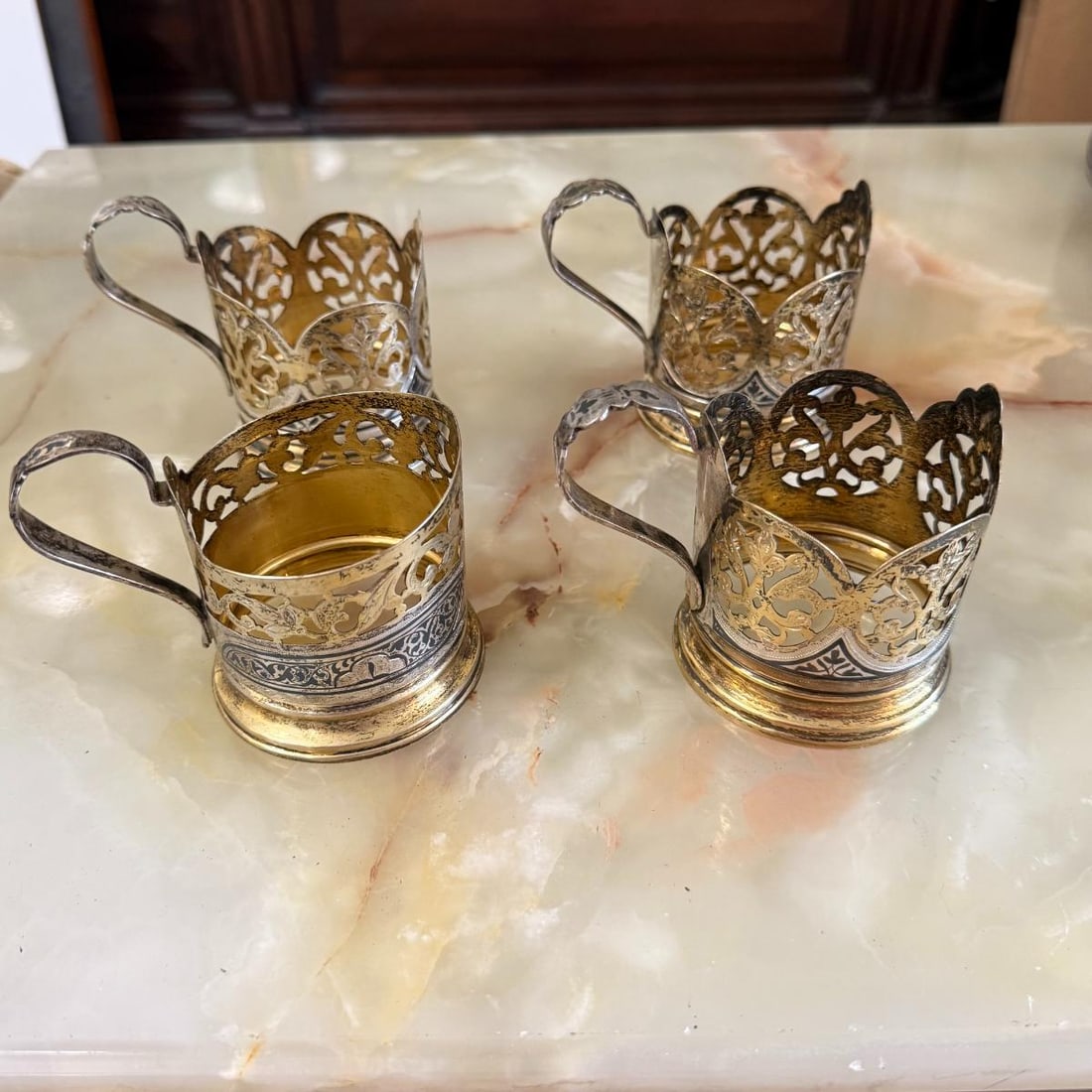 Antique Russian 875 Silver Tea Cup Holder Set of 4: Metal : 875 Silver Designer : n/a Measurements : D of the base 72mm, D of glass will fit - 62mm. H: 71mm. Marked: : Russian silver mark. Weight: : 10.17 ozt Condition: