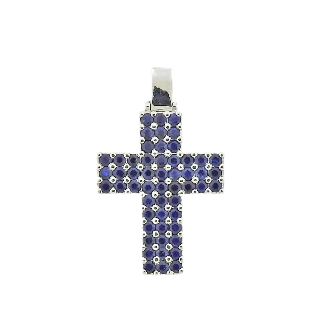 18K Gold Sapphire Cross Pendant: Metal : 18K White Gold Designer : Not signed Gemstone : Sapphires Measurements : Pendant is 30mm x 20mm Marked: :750, RC Weight: : 8.8 grams Condition: : E