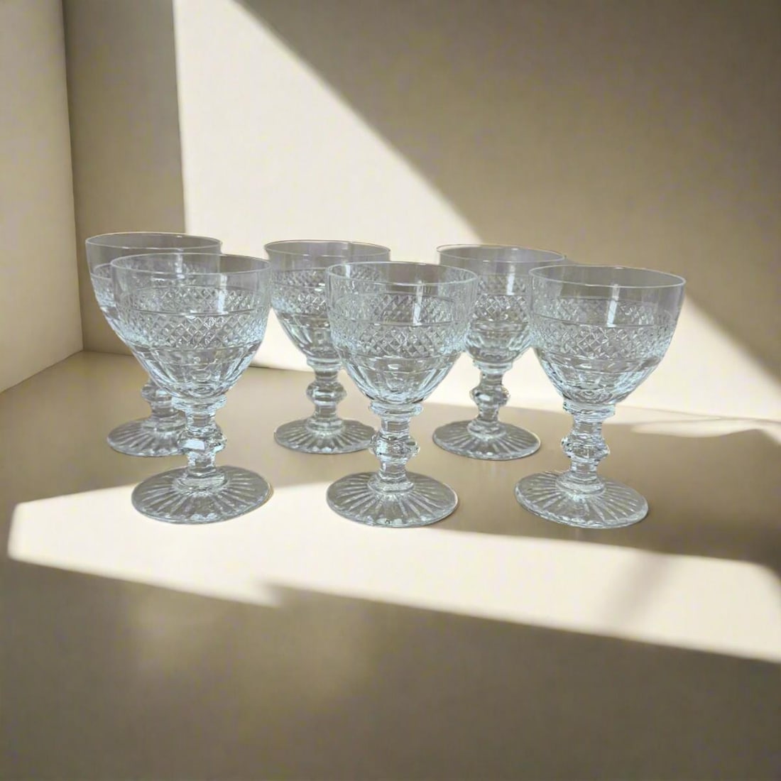 Set of 6 Saint-Louis Crystal Trianon Claret Wine: Material : Crystal Designer : Saint-Louis Measurements : Approx. H: 4 1/4'', D: 2 5/8'' Marked: : Saint-Louis Condition: : New/store sample. Additional: With box.