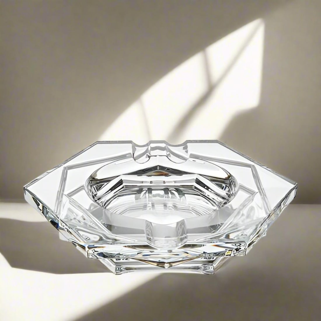 Baccarat Crystal Abysse Ashtray 2606795: Material : Crystal Designer : Baccarat Measurements : 7 7/8'' x 9 1/8'', 1 1/4" high. Marked: : Baccarat Condition: : New/store sample. Additional: With box.