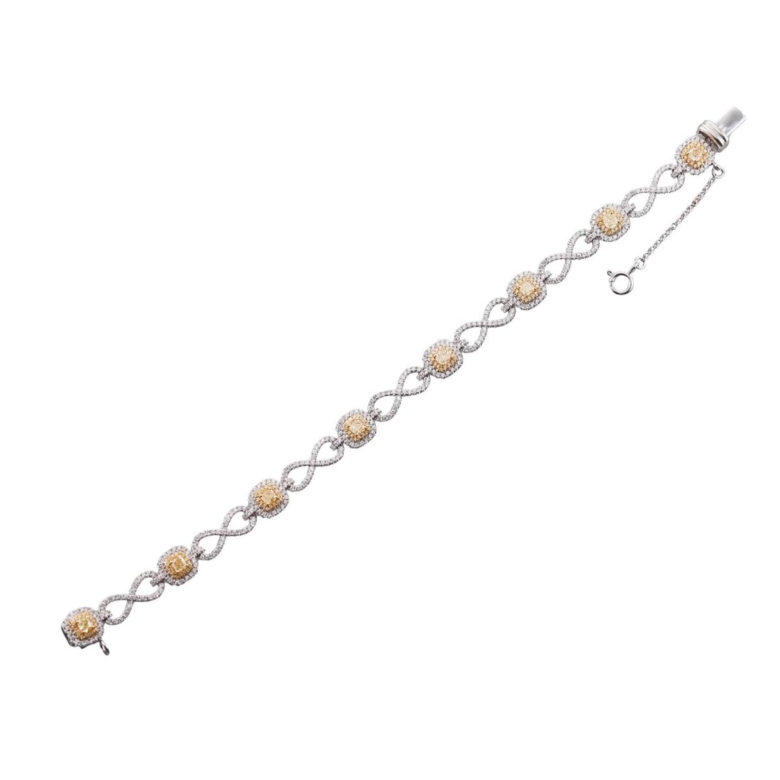 Effy 14k Gold 3.34ctw Fancy Yellow Diamond Canare Infinity Tennis Bracelet: Metal : 14k White Yellow Gold Designer : EFFY Gemstone : Fancy yellow diamonds 1.18ctw, White Diamonds 2.16ctw. Measurements : Bracelet is 7" long and 8mm wide. Marked: : EFFY 14k.