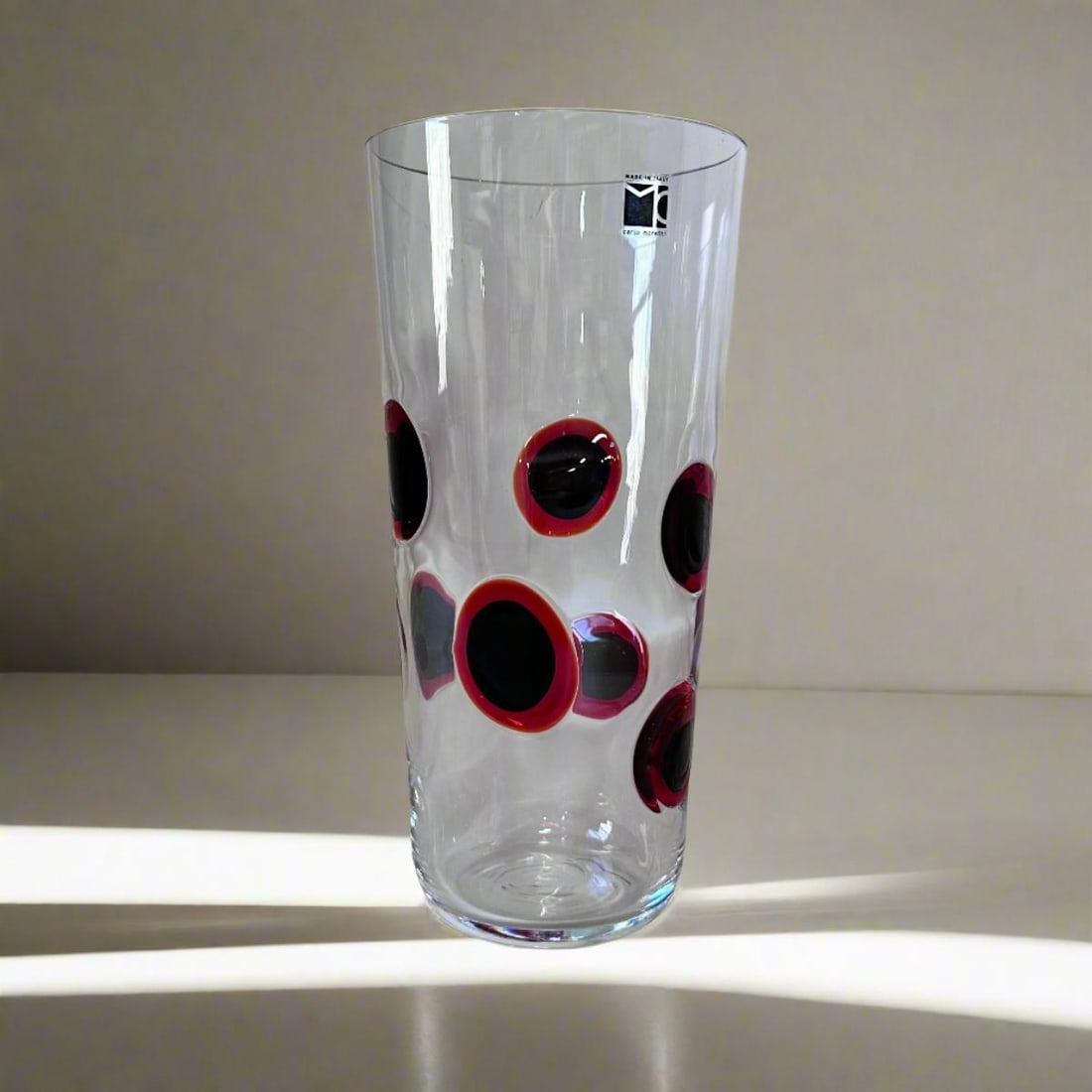Carlo Moretti Red Bora Hand Blown Murano Glass Vase: Material : Murano Glass Designer : Carlo Moretti Measurements : 9.2" (H) x 4.4" (top Diam.) / 23.4cm (H) x 11.3cm (top Diam.) Marked: : Carlo Moretti Condition: : New/store sample