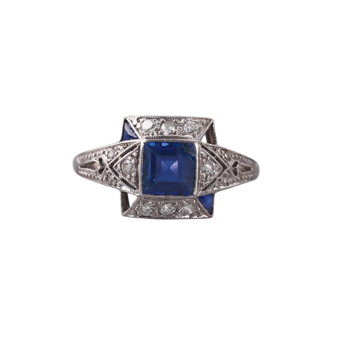 Platinum Sapphire Diamond Ring: Metal : Platinum Designer : Not Signed Gemstone : Sapphires (center stone chipped) , Diamonds approx. 0.15ctw. Measurements : Ring size 7.25, top is 10.5mm. Marked: : Tested plat.