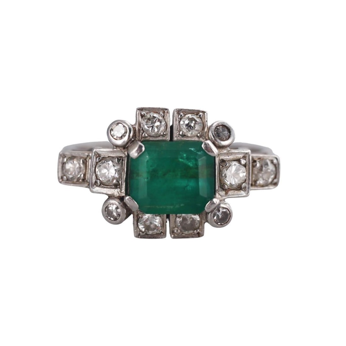 Mid Century Platinum Emerald Diamond Ring: Metal : Platinum Designer : Not Signed Gemstone : Emerald - approx. 2ct ( 7.8 x 6.7 x 5.5mm, stone has small chips and abrasions), Diamonds approx. 0.46ctw. Measurements : Ring size 8.25, top is 12.