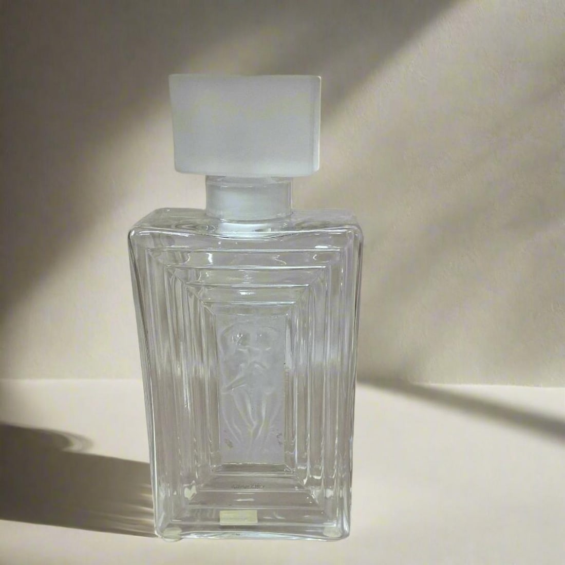 Lalique Crystal Duncan Perfume Bottle: Material : Crystal Designer : Lalique Measurements : D: 3.5'', H: 7 7/8'' Marked: : Lalique Condition: : New/Store Sample Additional: Box