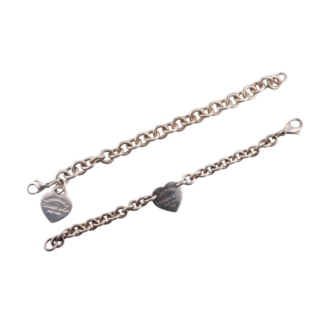 Tiffany & Co Return to Tiffany Sterling Silver Heart Bracelet Lot of 2: Metal : Sterling Silver Designer : Tiffany & Co Gemstone : None Measurements : Bracelets are 7.5" long each. Marked: : Tiffany & Co, 925. Weight: : 60.7 grams Condition: : Very Good. Additional: n/a