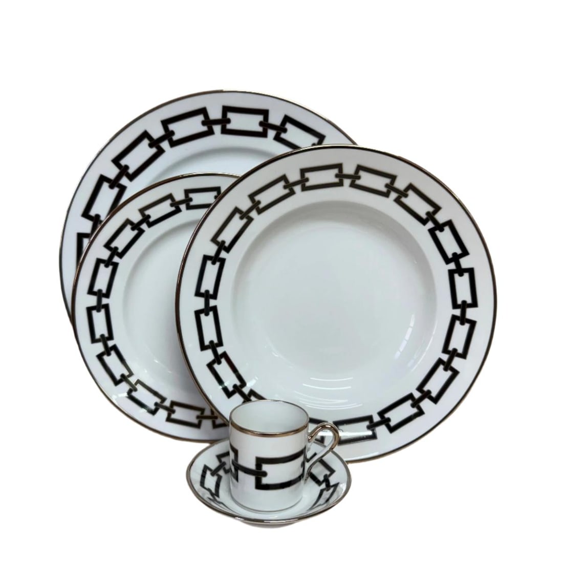 5pc Richard Ginori Catene Black Dinner Place Setting: Material : Porcelain Designer : Richard Ginori Measurements : Dinner Plate D: 11'', Soup Plate D: 9 1/2'', Dessert Plate D: 8 1/2'', Cup: D: 2'', H: 2 1/8'', Saucer D: 4 2/8''. Marked: : Richard Gin