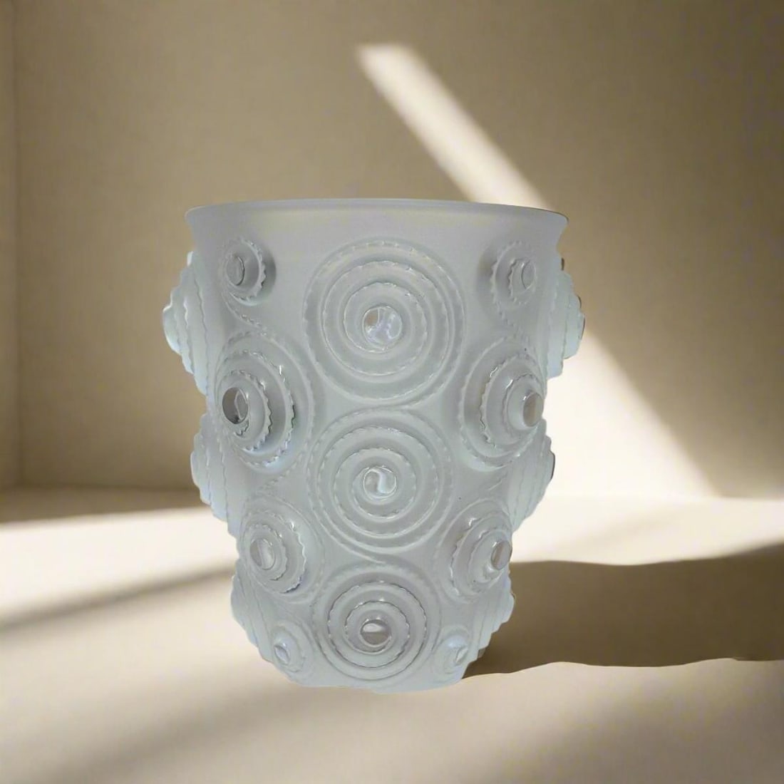 Lalique Crystal Spiral Vase 10307000: Material : Crystal Designer : Lalique Measurements : H: 6.5'' D: 5 3/4'' Marked: : Lalique Condition: : New/Store Sample Additional: Box