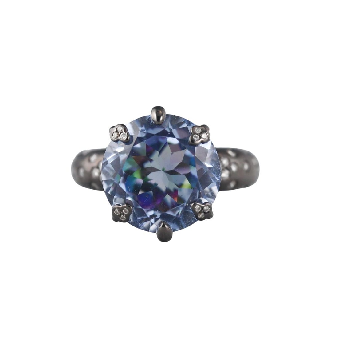 18k Blackened Gold Blue Stone Diamond Ring: Metal : 18k Blackened White Gold Designer : Not Signed Gemstone : Blue Stone RI 1.54-1.55, Diamonds approx. 0.22ctw. Measurements : Ring size 6.75. Marked: : 750. Weight: