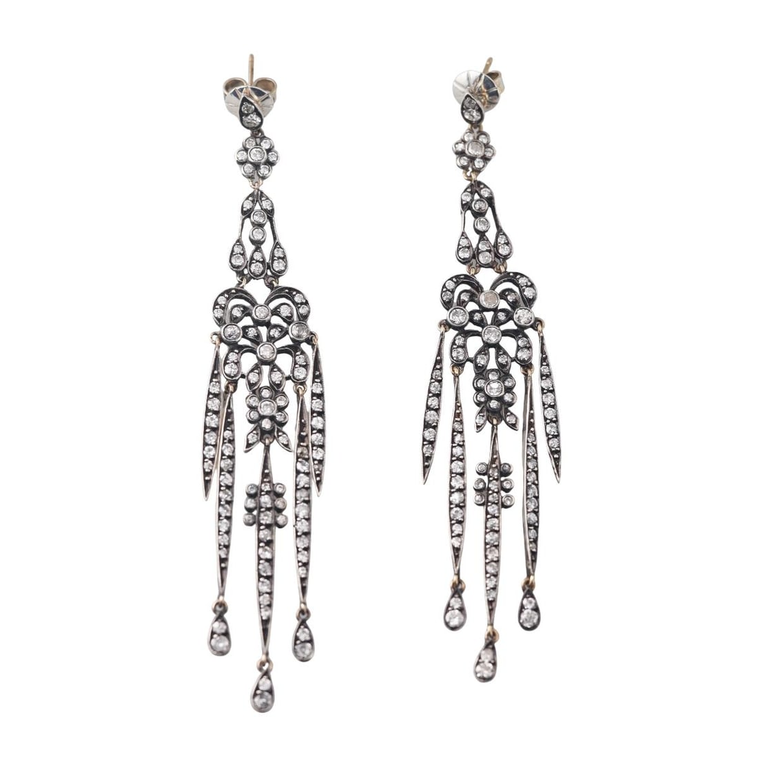 6ctw Diamond Silver Gold Long Chandelier Earrings: Metal : Silver / Gold Wash Designer : Not Signed Gemstone : Diamonds approx. 6 ctw. Measurements : Earrings are 4 1/8" long. Marked: : Tested silver. Weight: : 20.3 grams Condition: : Excellent.