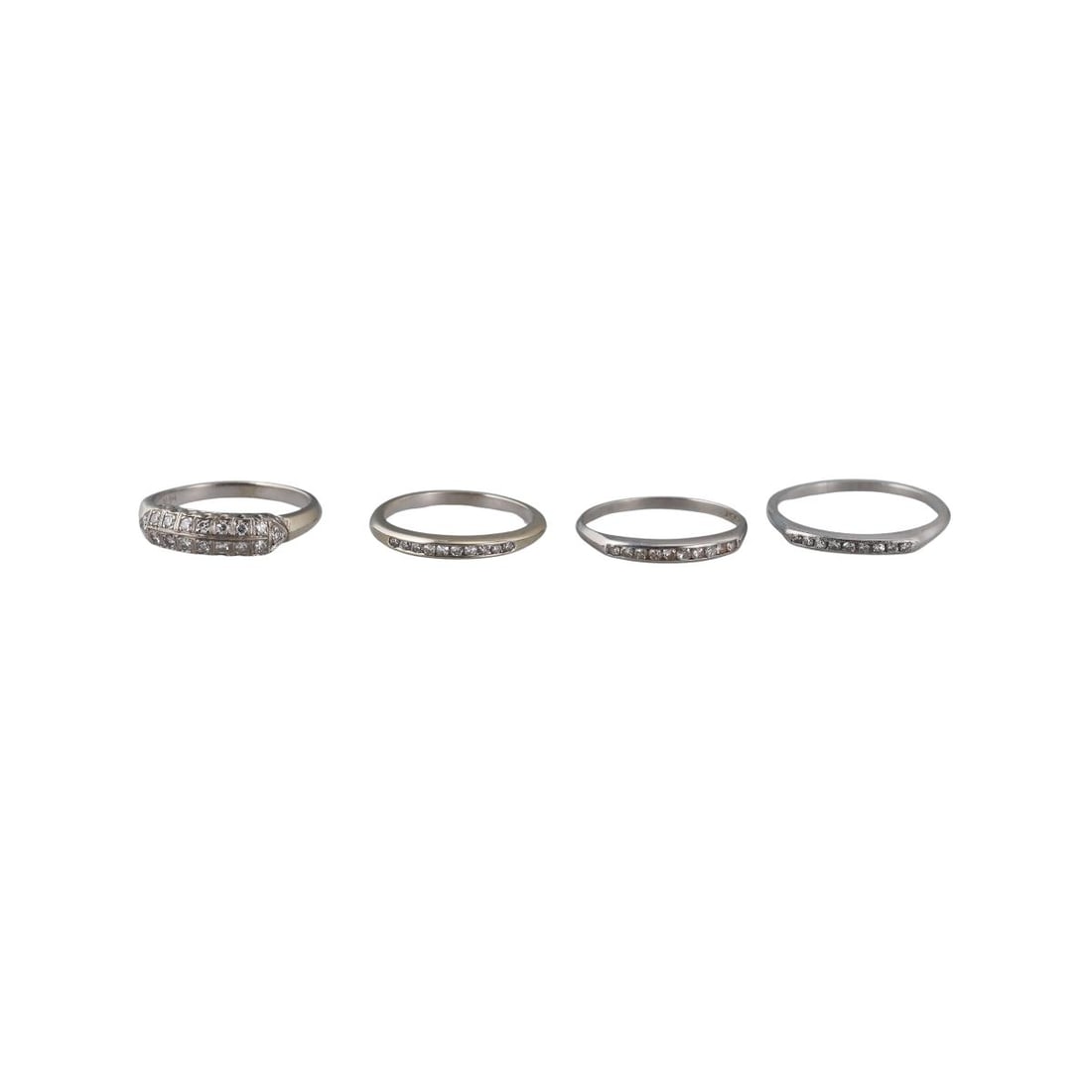 Mid Century Platinum 14k Gold Diamond Band Ring Lot of 4: Metal : Platinum (2) / 14k (2) Gold Designer : Not Signed Gemstone : Diamonds approx. 0.80ctw. Measurements : Ring sizes - 6.75; 8; 6; 7. Marked: : Plat, 14k. Weight: : 9.1 grams Condition: :