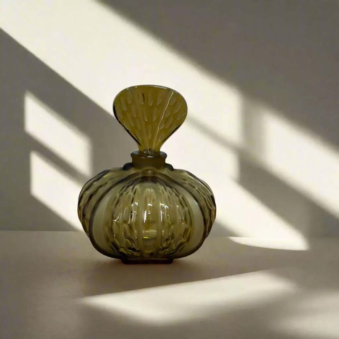 Lalique Mirabel Crystal Perfume Bottle: Material : Crystal Designer : Lalique Measurements : D: 5'', H: 6'' Marked: : Lalique Condition: : New, store sample Additional: Comes with Lalique box (not matching to this item)