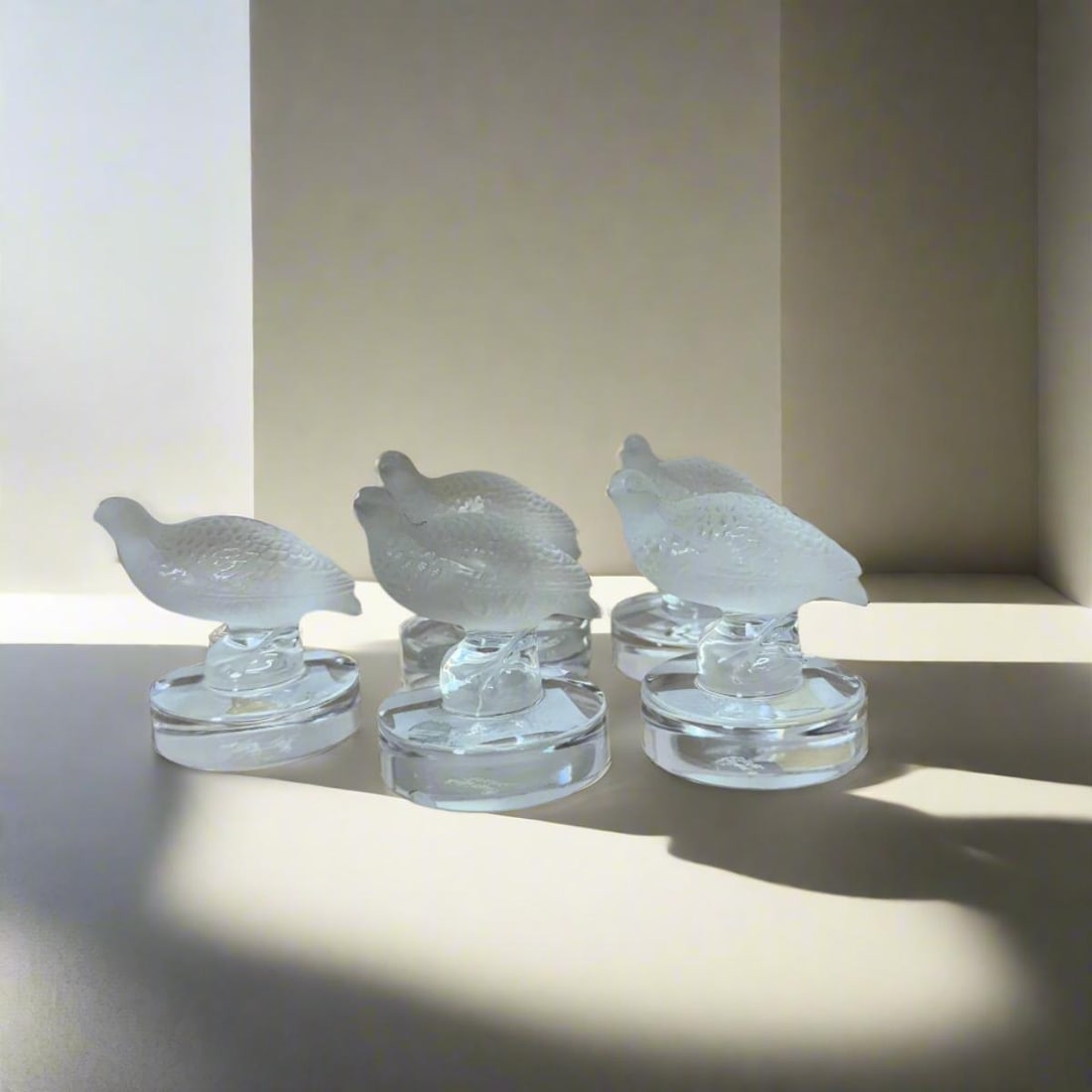 Lalique Crystal Bird Figurine Place Card Setting Set of 5: Material : Crystal Designer : Lalique Measurements : H 2 1/2", Base D: 1 7/8'' Marked: : Lalique Condition: : New, store sample Additional: Comes in original Lalique box, but
