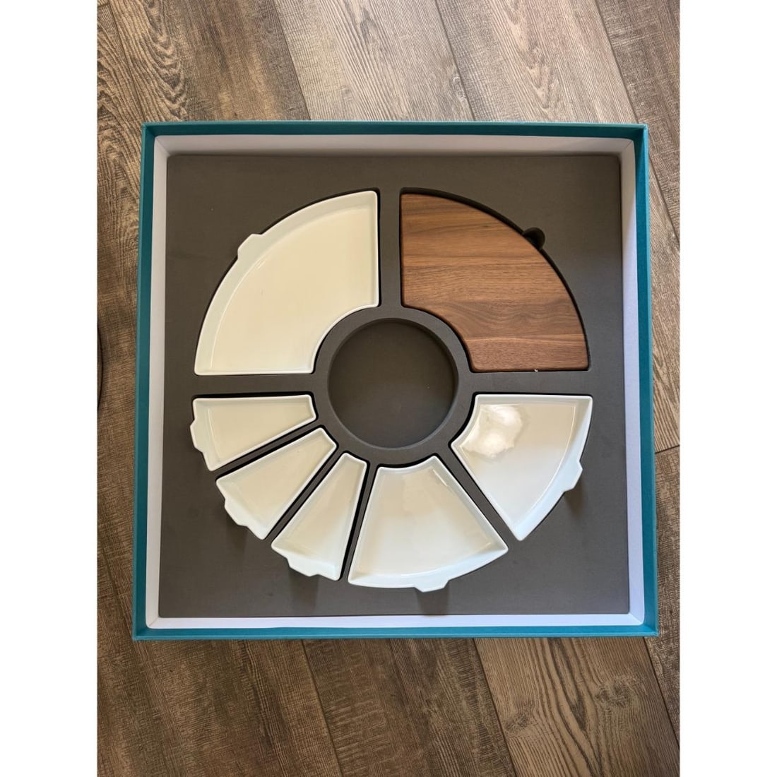 Christofle Mood Asia Stainless Steel Wood Serving Tray B0590010002: Material : Stainless Steel / Walnut Wood Designer : Christofle Measurements : Tray D 16". Marked: : Christofle. Condition: : New/Store Sample. Center bowl is missing. Addit