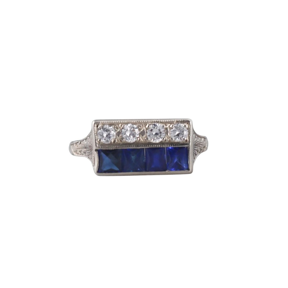 Art Deco 20k Gold Diamond Sapphire Ring: Metal : 20k White Gold Designer : Not Signed Gemstone : Diamonds approx. 0.20ctw, French cut sapphires (abraded) Measurements : Ring size 5.75, top is 7.5mm wide. Marked: : 20k.