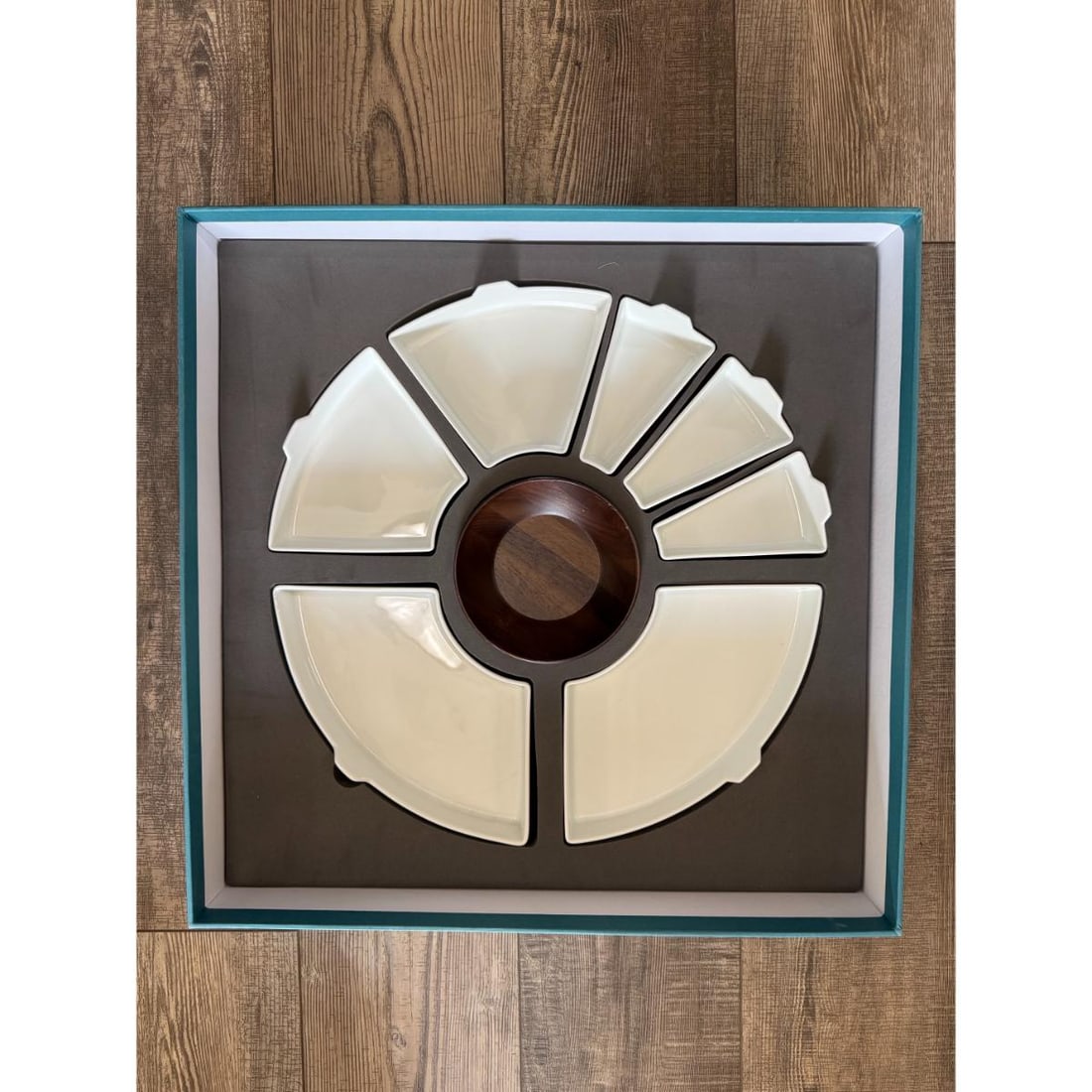 Christofle Mood Asia Stainless Steel Wood Serving Tray B059001002: Material : Stainless Steel / Walnut Wood Designer : Christofle Measurements : Tray D 16". Marked: : Christofle. Condition: : New/Store Sample. Center bowl has minor dents/chips on the