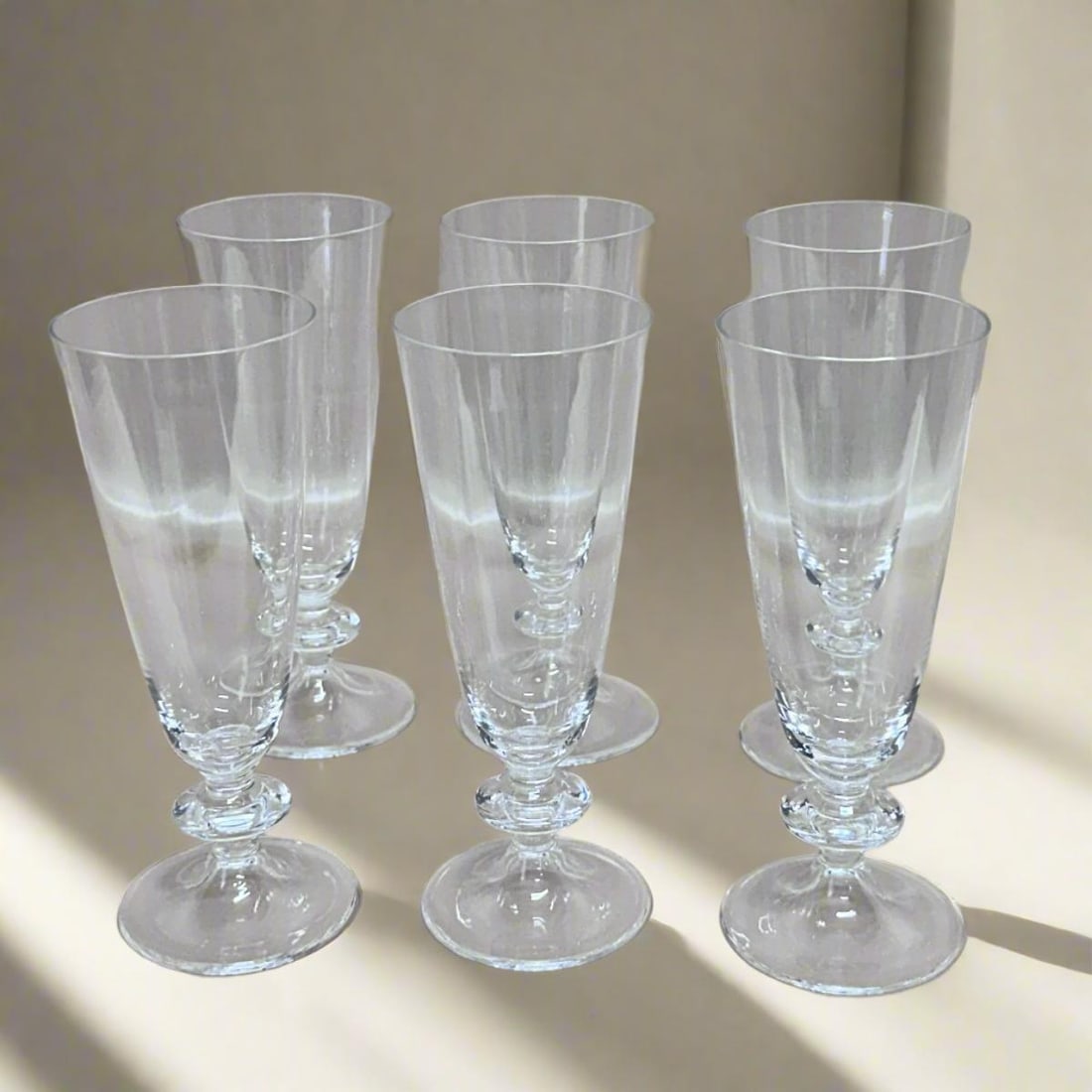 Set of 6 Nason & Moretti Murano Champagne Flutes Glass: Material : Murano glass Designer : Carlo Moretti Measurements : 6.5" (H) x 2.5" (top Diam.) / 16.5cm (H) x 6.3cm (top Diam.) Marked: : Carlo Moretti Condition: : New, Store sample