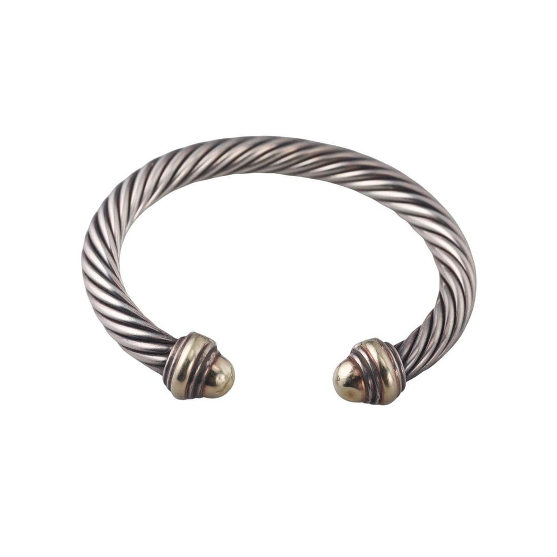 David Yurman Cable 14K Gold Sterling Silver Cuff Bracelet: Metal : 14K yellow Gold, Sterling Silver Designer : David Yurman Gemstone : None Measurements : Bracelet will fit up to 7.25" wrist. Width is 7mm. Marked: : D.Y., 585, 925 We