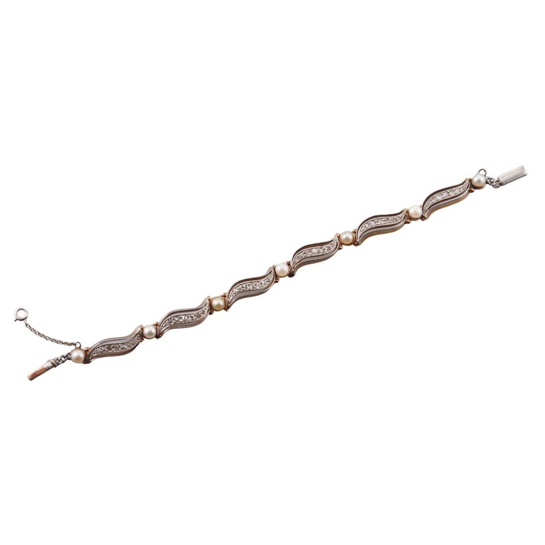 Antique 14k Gold Platinum Diamond Pearl Bracelet: Metal : 14k Gold / Platinum top Designer : Not Signed Gemstone : Diamonds approx. 0.50ctw, Pearls Measurements : Bracelet is 6 1/8" long and 6mm wide. Marked: : Tested 14k plat. Weight: : 16.2 grams
