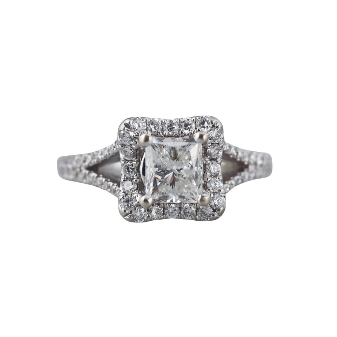 14k Gold 1.48ctw Diamond Engagement Ring: Metal : 14k White Gold Designer : Not Signed Gemstone : Center diamond approx. 1.00ct I/VS, Side diamonds 0.48ctw. Measurements : Ring size approx. 4, sizing balls can be removed to increase the