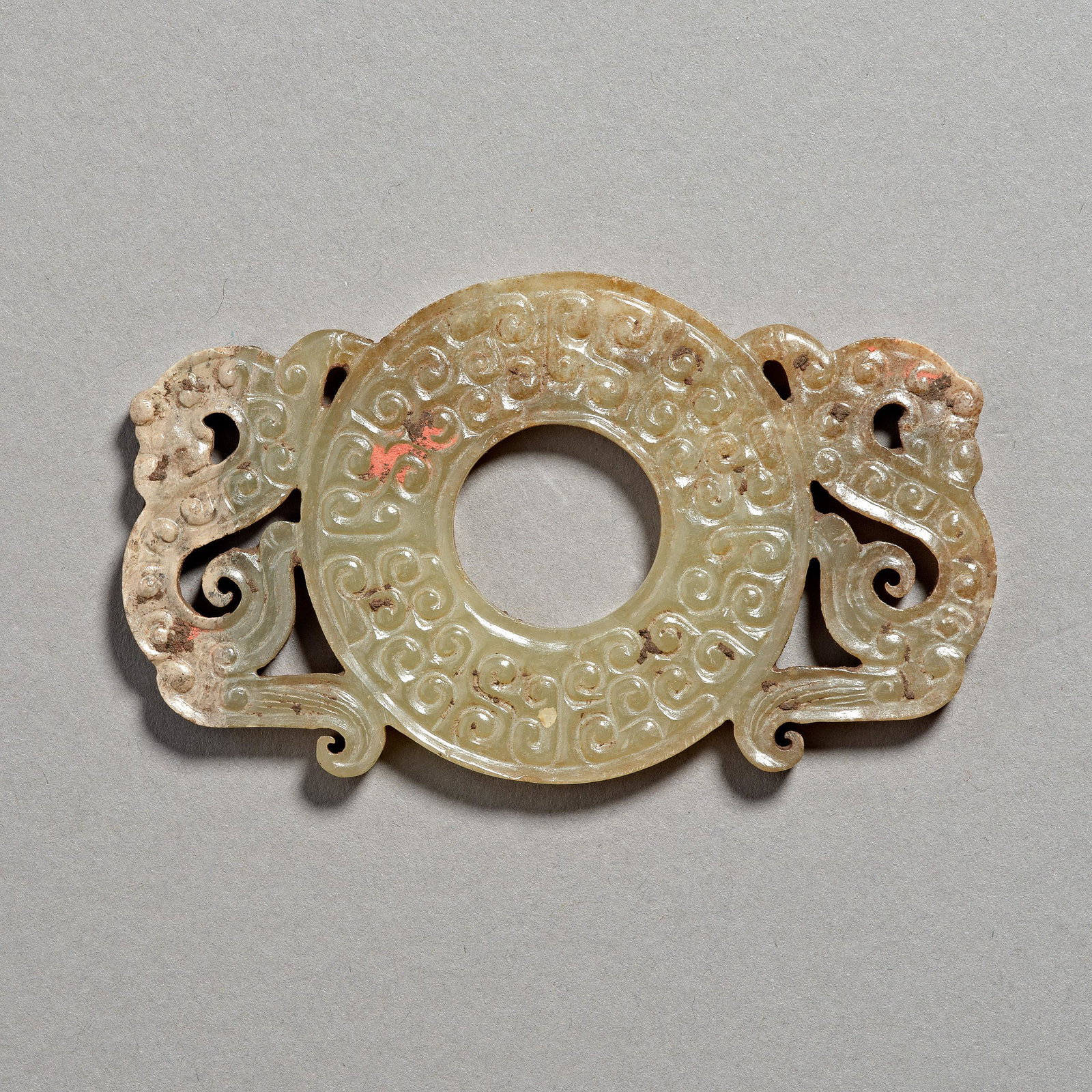 Han Dynasty of China,Hetian Jade Wall: H. 4.2 cm. W. 7.3 cm.Weight. 27 g.
