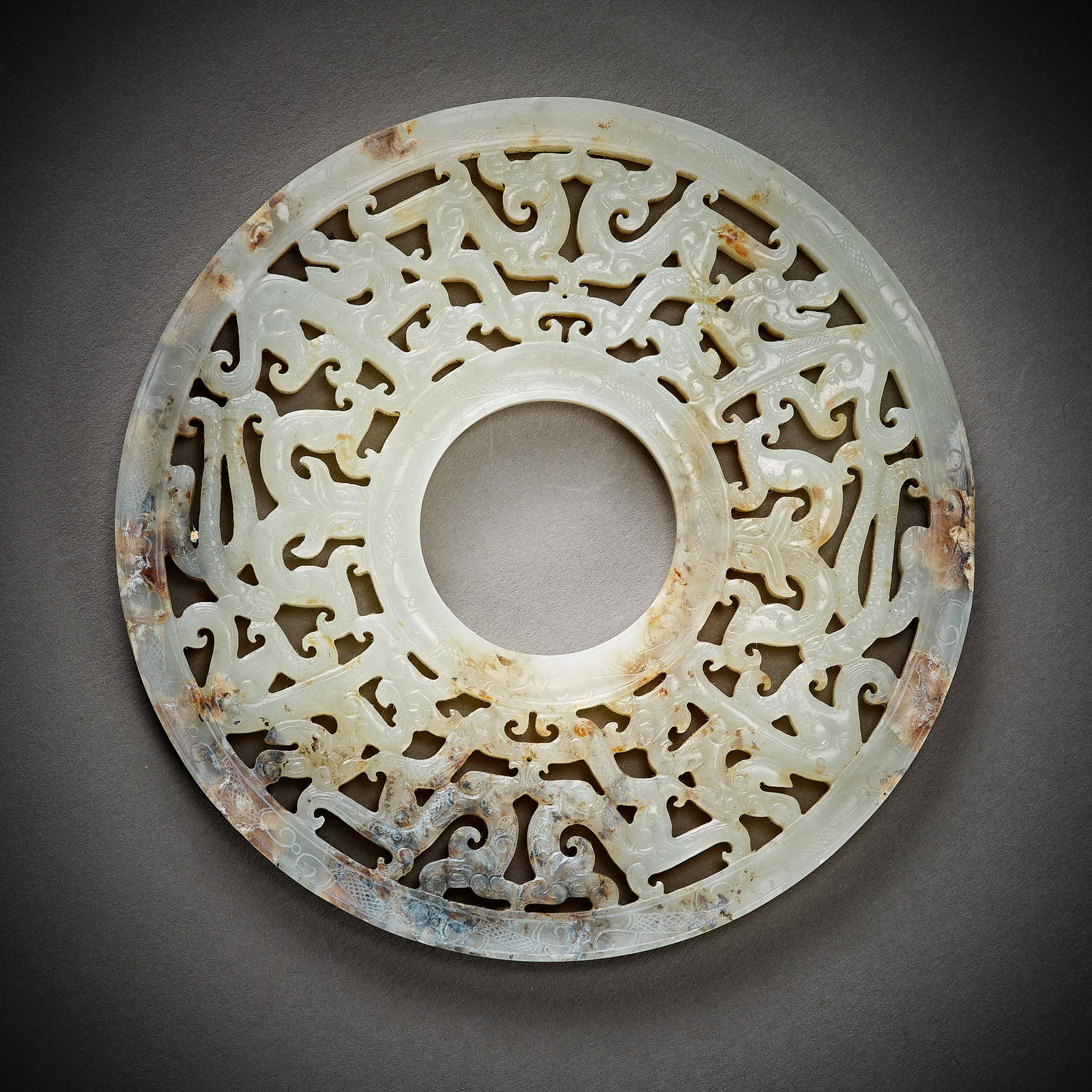 Han Dynasty of China,Hetian Jade Wall: d. 10.3 cm. Weight. 106 g.